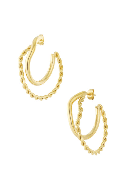 Pair of gold hoop earrings featuring one smooth and one twisted braided hoop, studio white background