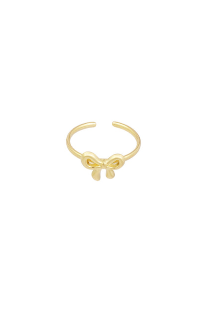 Gold minimalist open bow ring on white background