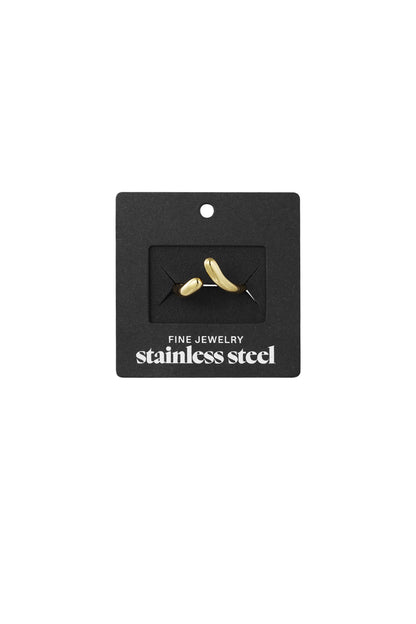 Gold twist open band ring displayed on black retail packaging labeled 'stainless steel fine jewelry'