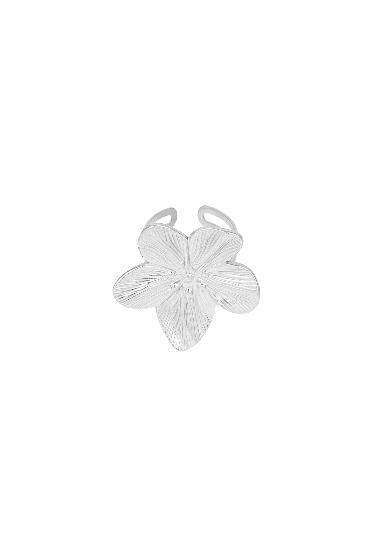 Silver flower shaped statement ring with detailed petal texture on white background