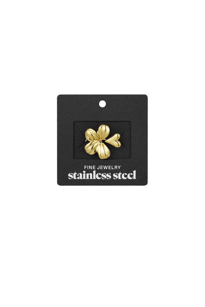 Gold floral statement ring displayed on black branded jewellery card