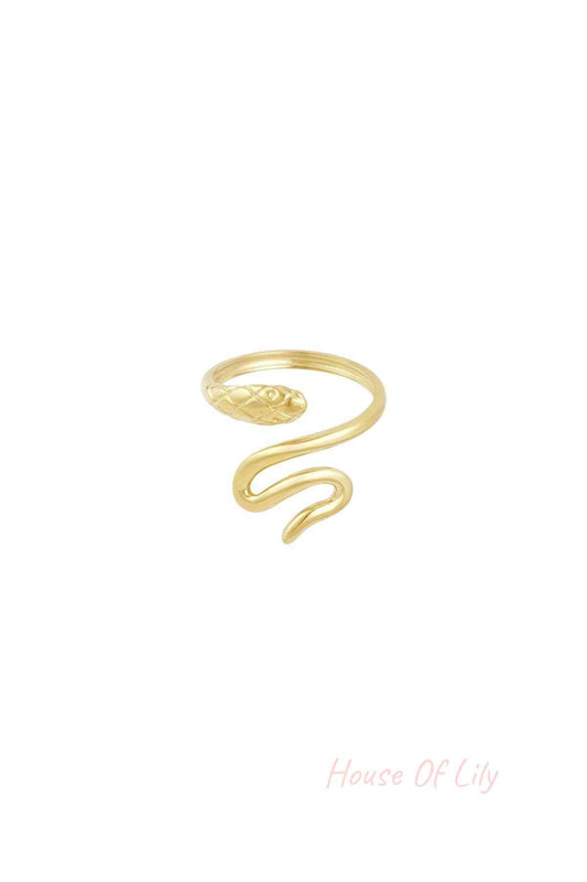Gold snake statement ring isolated on white background displaying elegant snake motif and open adjustable band
