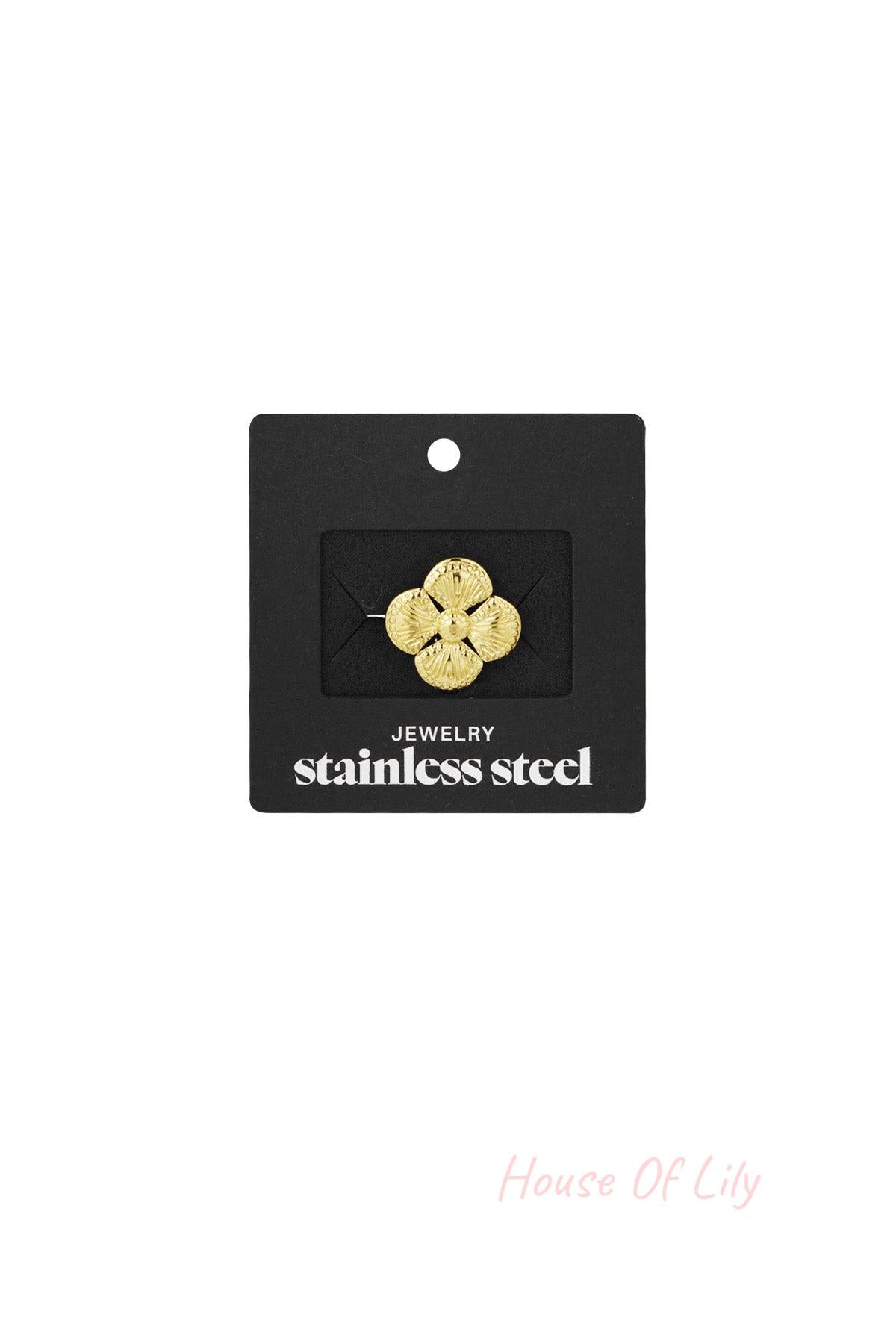 Gold textured clover ring displayed on black jewellery card labelled 'stainless steel'