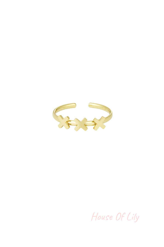 Gold-tone adjustable ring with three cross shapes on a white background