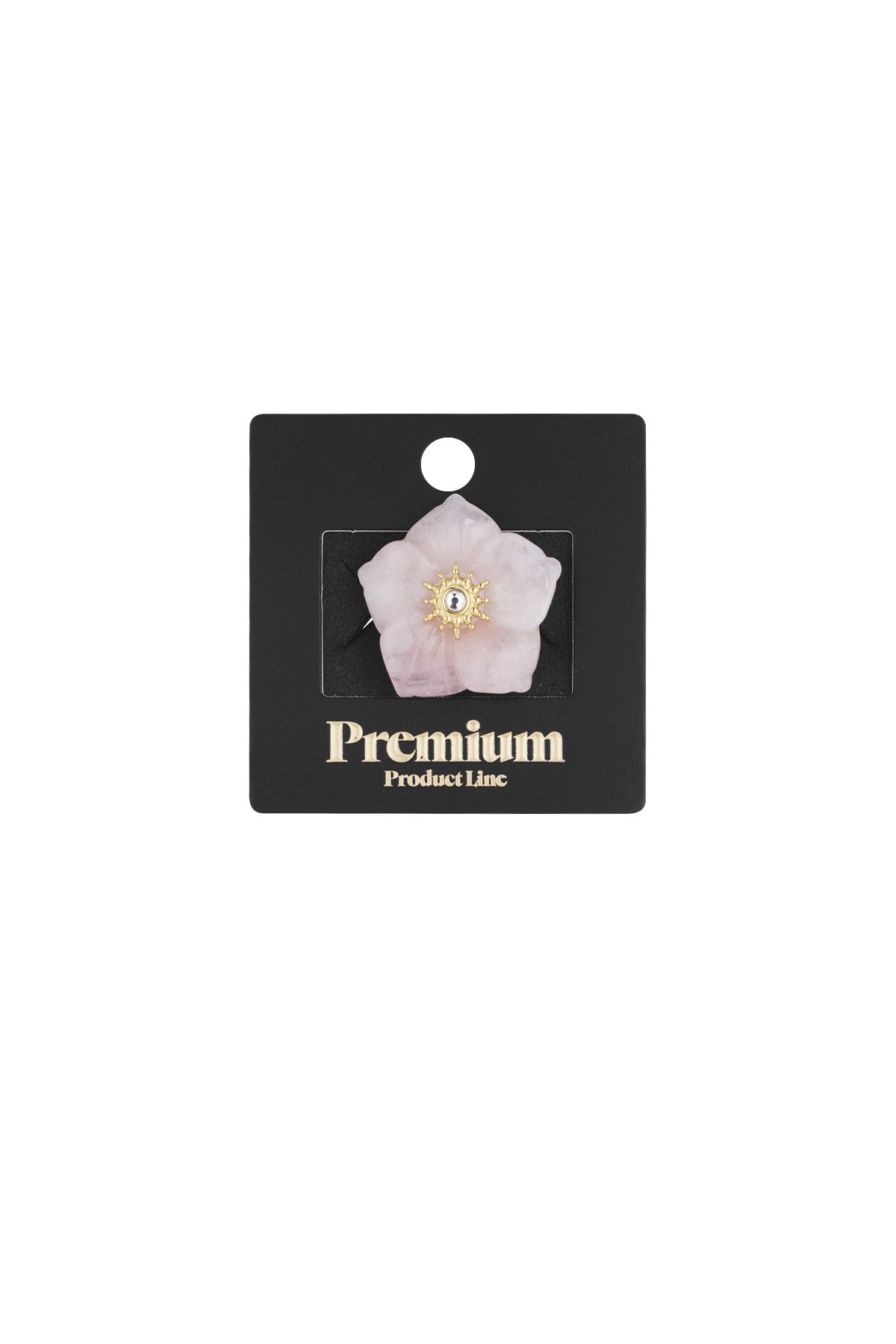 Pink floral statement ring displayed on black Premium Product Line card