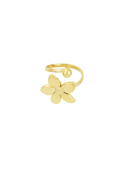 Close-up of gold flower statement ring with five petals and a small gold sphere on an adjustable band