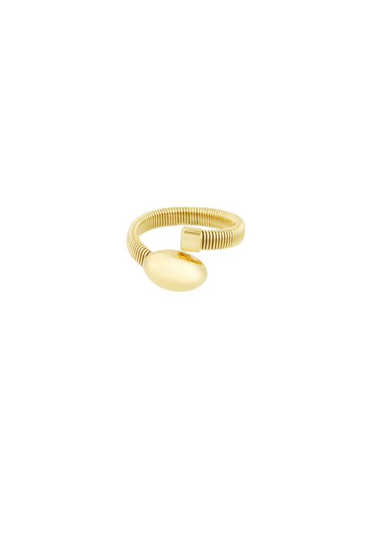 Close-up of a gold-tone coil ring with an oval and a small square end detail on white background