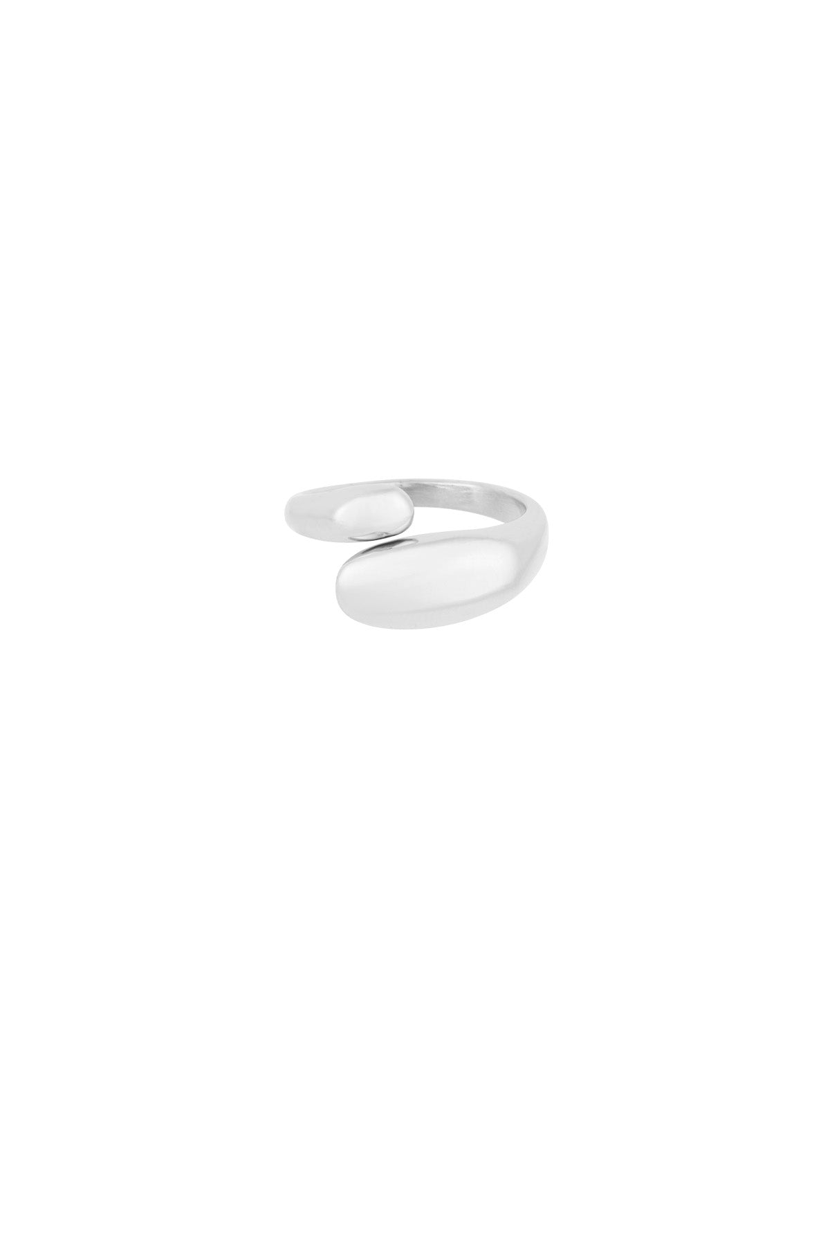 Close-up of silver-toned version of the sculptural open ring with smooth rounded ends on white background