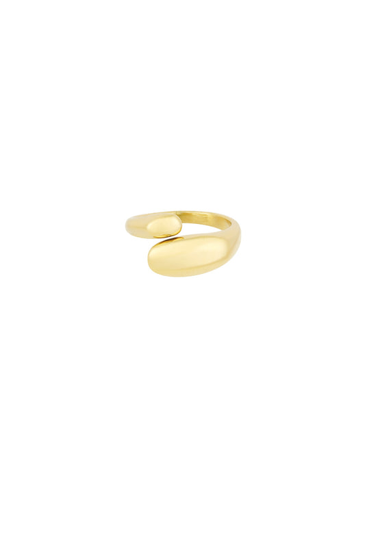 Close-up of a gold-toned open sculptural ring with smooth rounded ends on white background