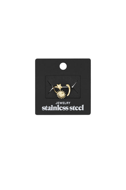 Celestial ring set pinned on black packaging card labeled 'stainless steel jewelry', showing star, moon, sun gold-toned charms