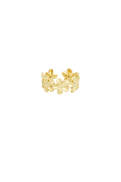 Gold daisy flower statement ring with crystal centres on white background