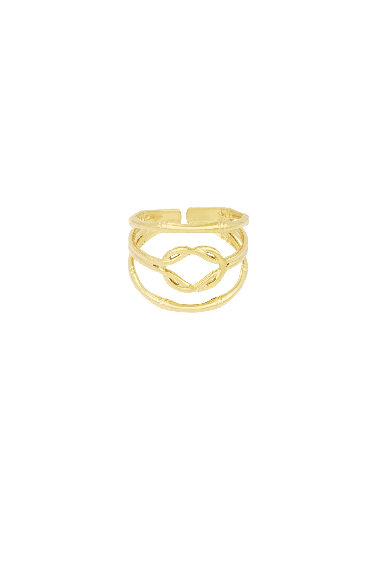 Close-up of a gold-tone layered knot statement ring on white background, showing detailed intertwining bands
