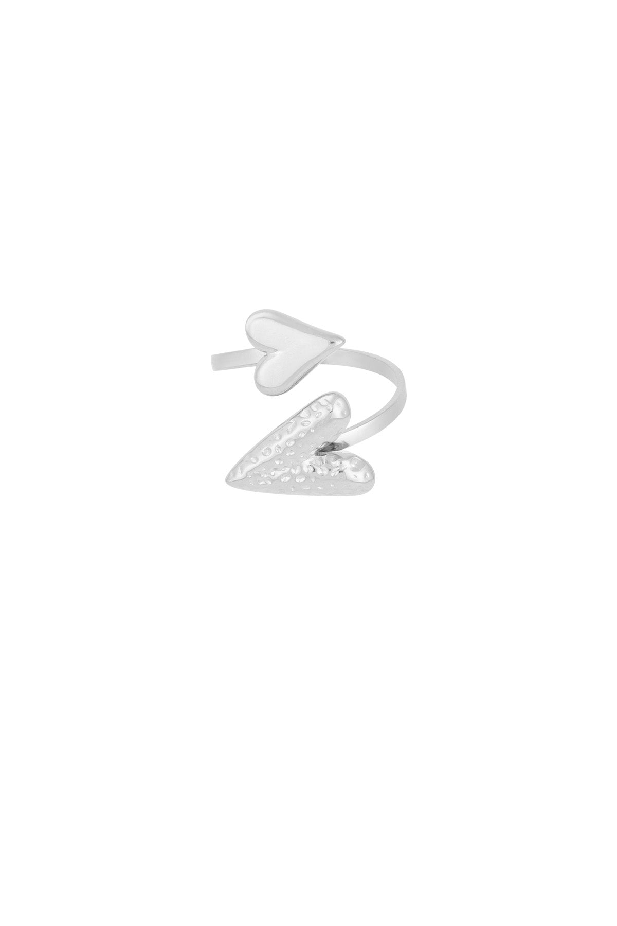 Silver adjustable wrap ring with two hearts, featuring one smooth and one hammered heart shape, isolated on white background