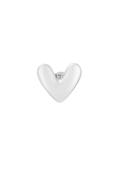 Silver polished heart brooch with smooth rounded edges on a white background
