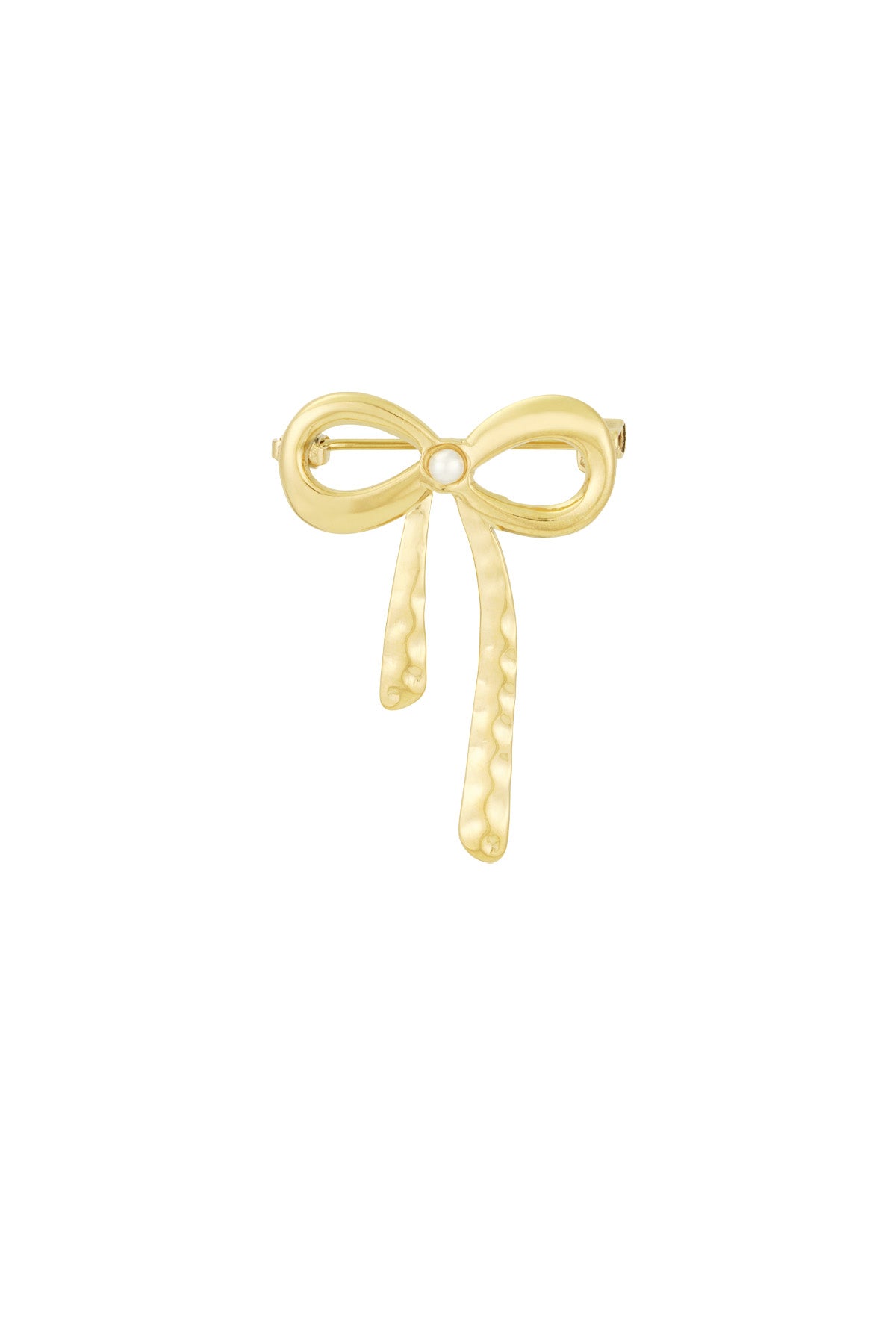 Gold hammered bow brooch with pearl centerpiece on white background