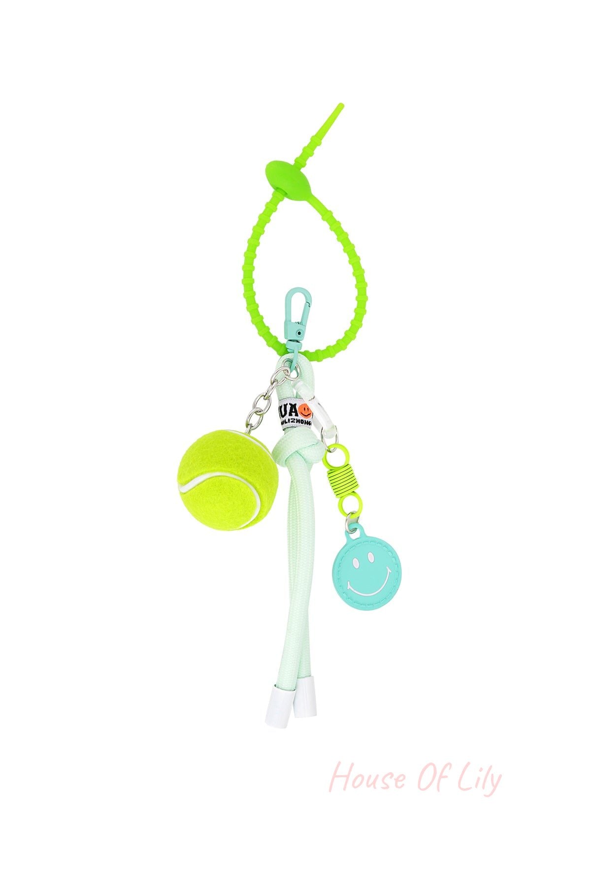 Bright green tennis ball keychain with braided loop, smiley face charm, and metal clasp on white background
