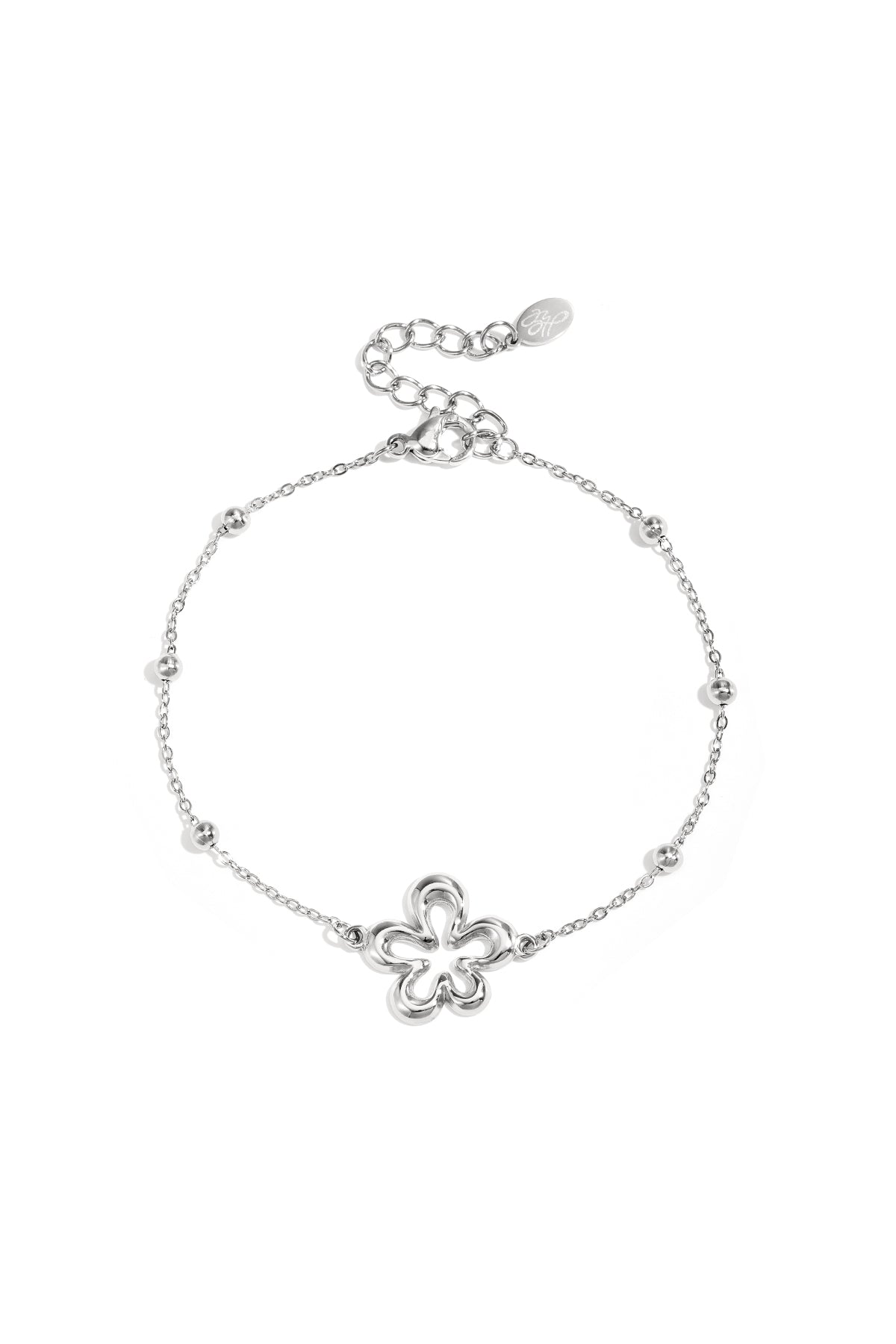 Minimalist silver floral charm bracelet with single flower charm on chain and lobster clasp on white background