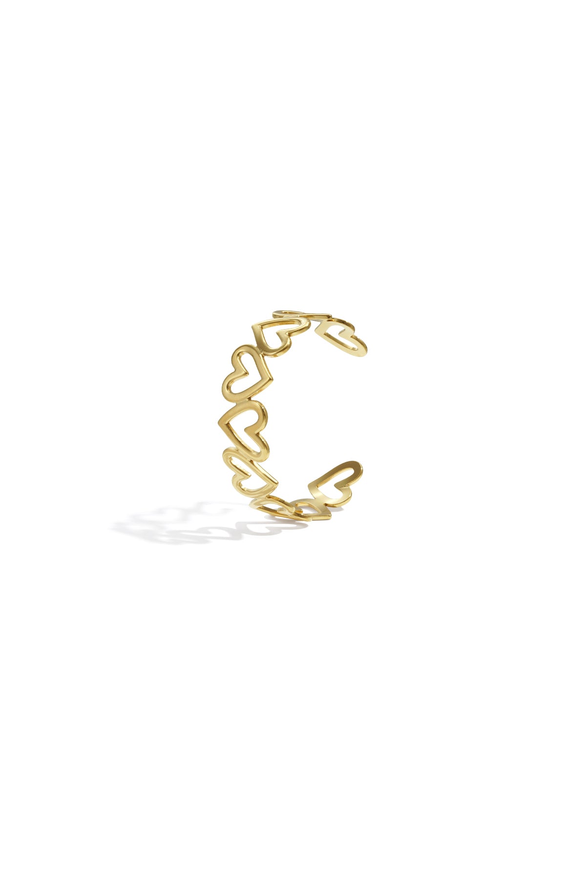 Gold-tone open cuff bracelet featuring linked hollow heart shapes on white background