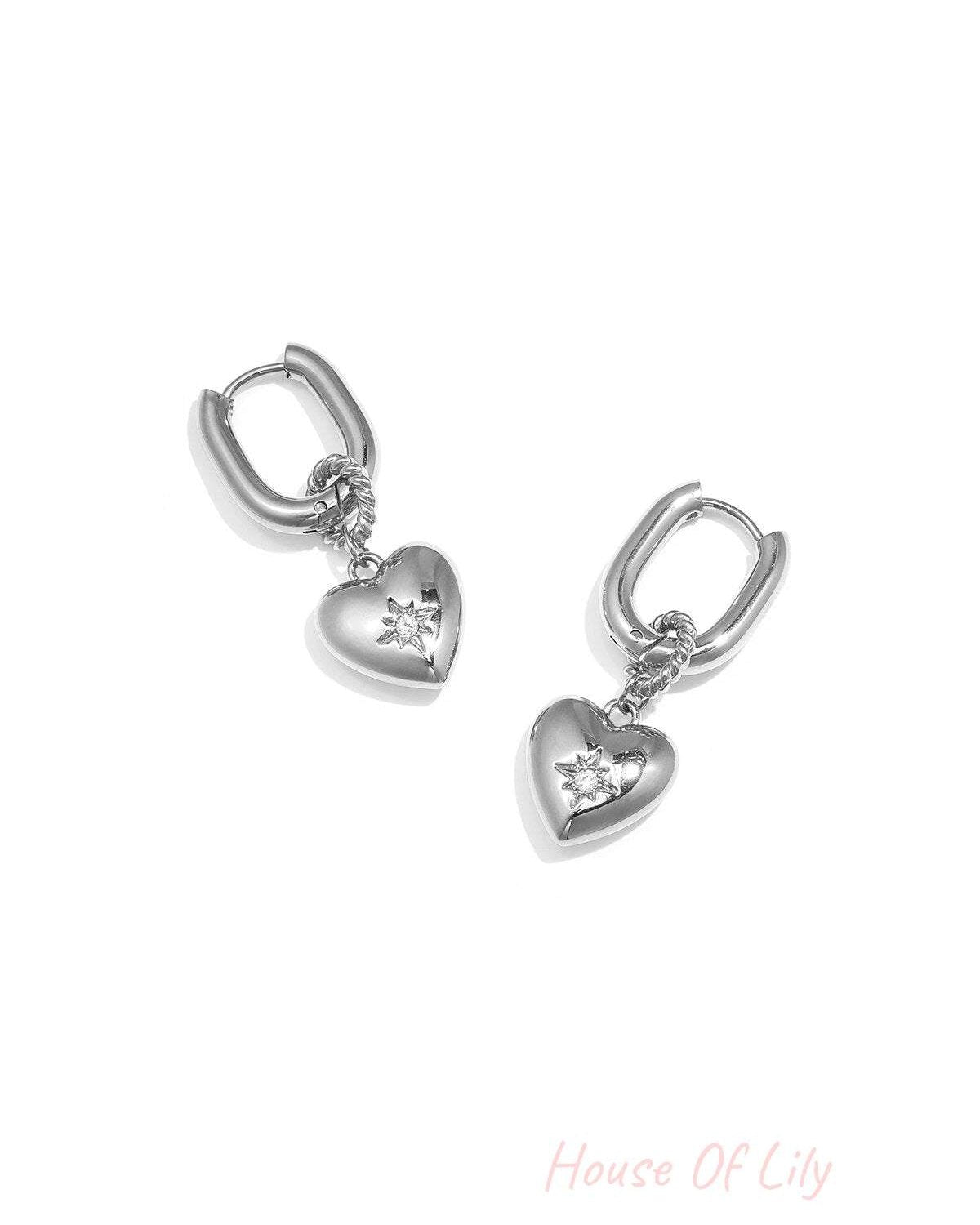 Squoval earrings with heart pendant and stone