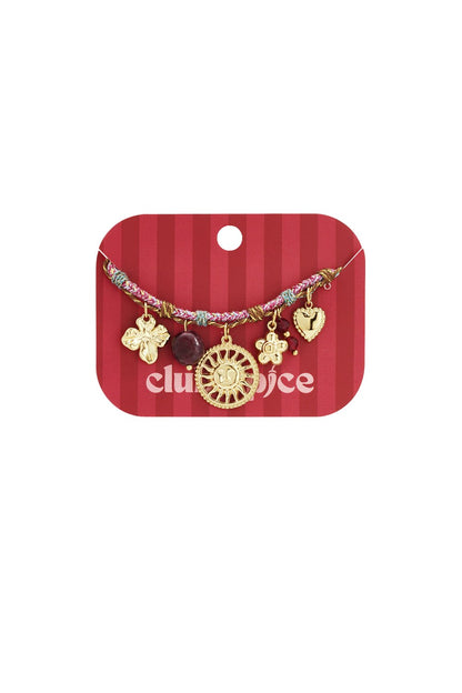 Boho bracelet featuring a braided pink cord and gold charms, including a sun, flower, heart, and clover on a red card.