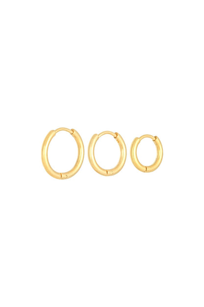 Set of three gold stainless steel hoop earrings in small, medium, and large sizes displayed against a white background