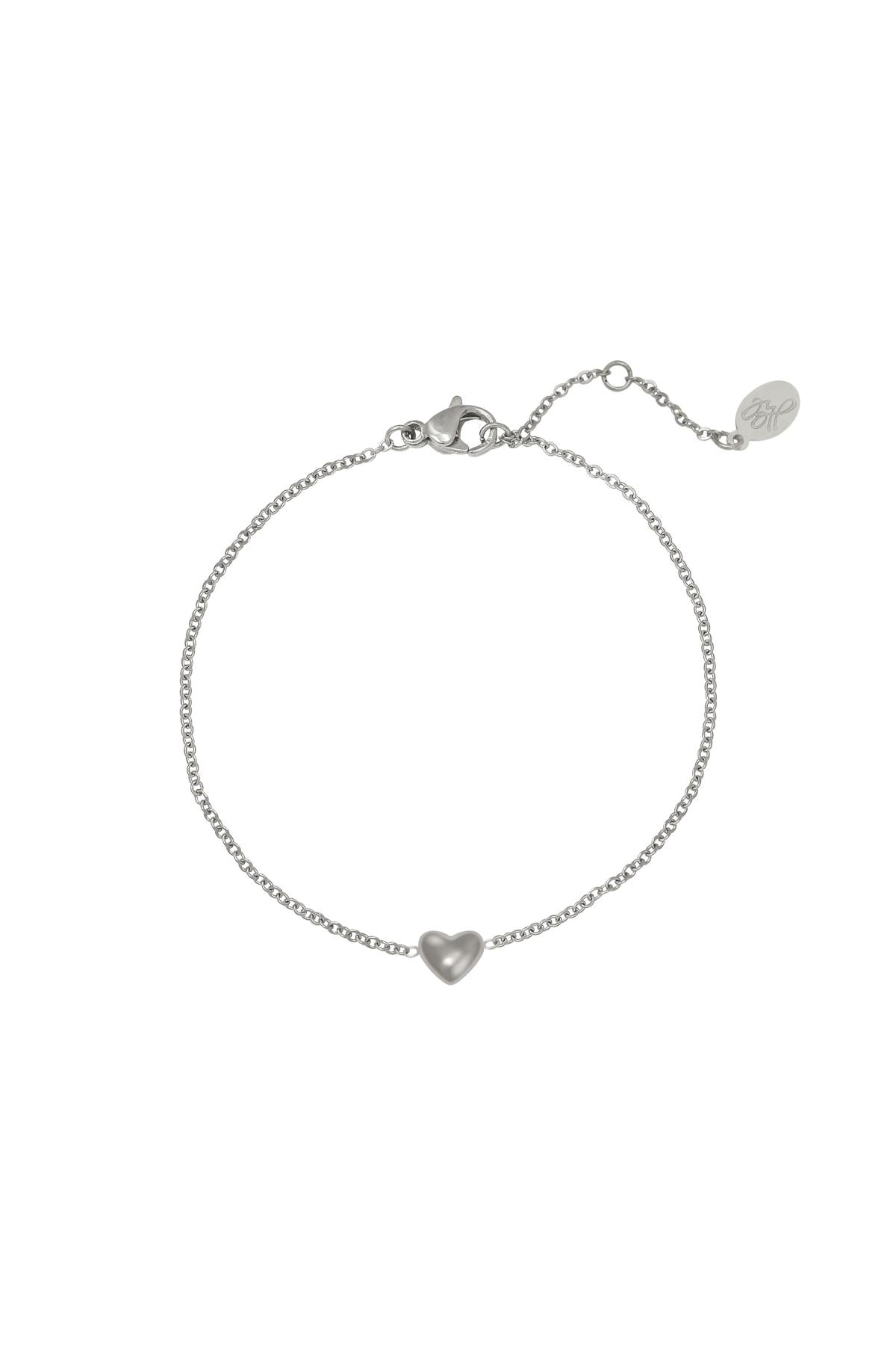 Silver delicate chain bracelet with small heart charm and lobster clasp