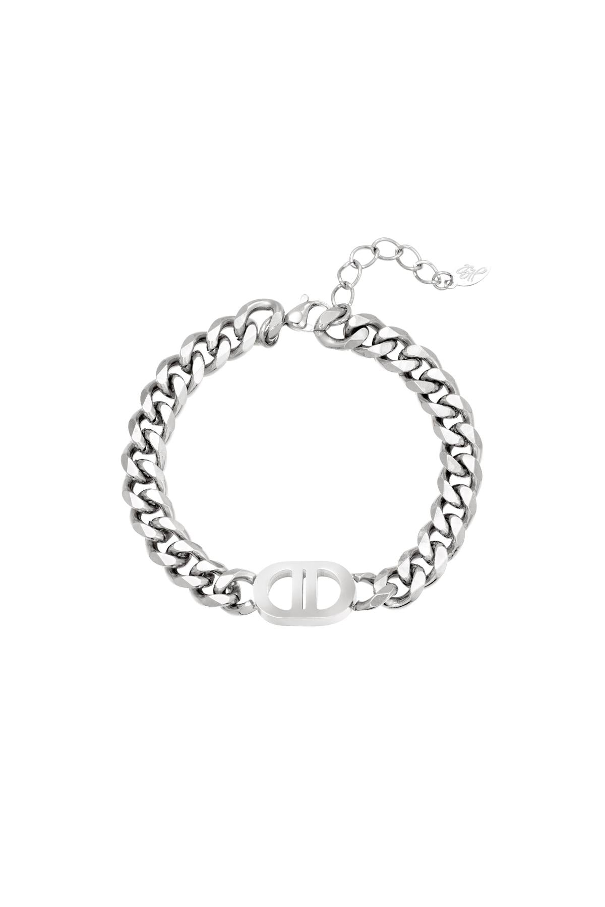 Silver chunky chain link bracelet with oval dual-bar centerpiece and adjustable clasp on white background