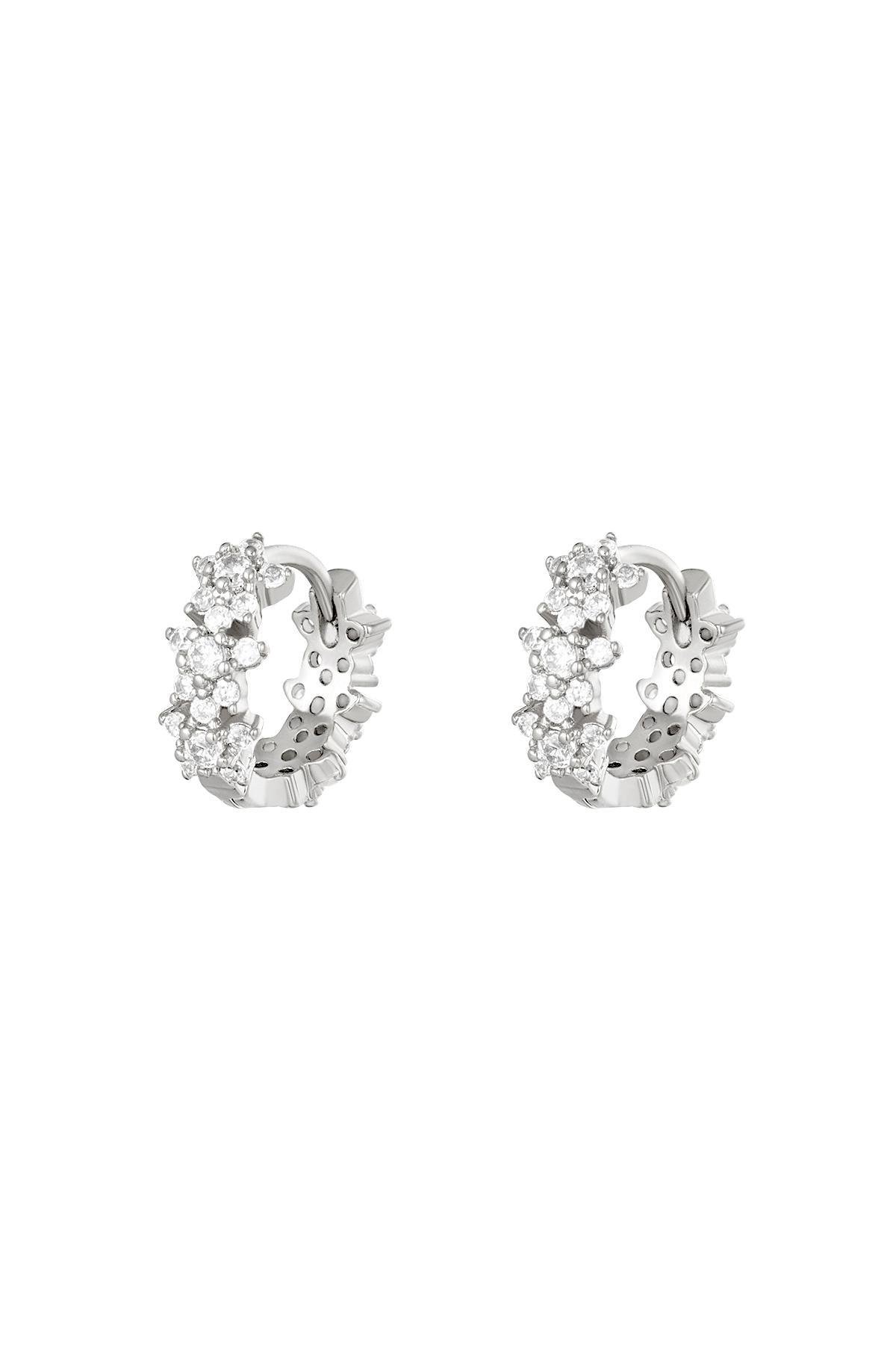Silver plated hoop earrings featuring clear clustered rhinestones in star pattern