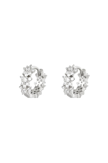 Silver plated hoop earrings featuring clear clustered rhinestones in star pattern
