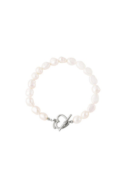 Freshwater pearl bracelet with irregular white pearls and silver heart-shaped toggle clasp on white background, showing variant option.