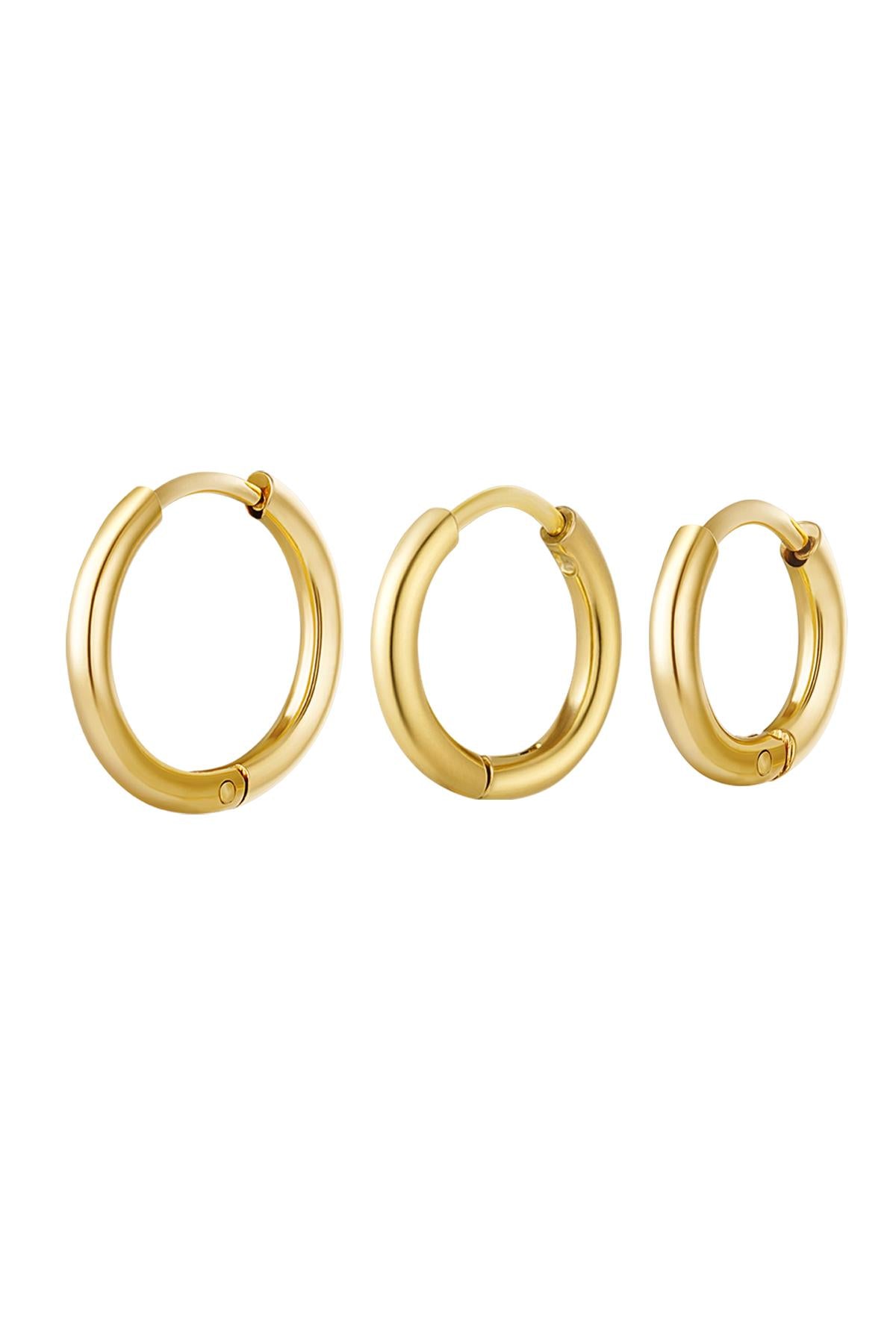 Set of three smooth polished gold hoop earrings in small, medium, and large sizes on white background angled differently