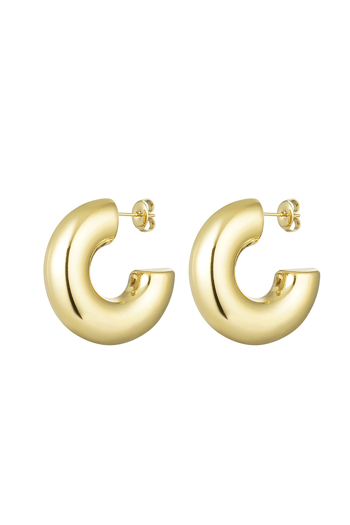 Pair of chunky half-round gold hoop earrings with a polished mirror finish on white background