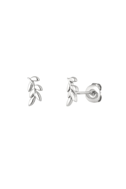 Close-up of silver-tone leaf design stud earrings with push-back closure on white background