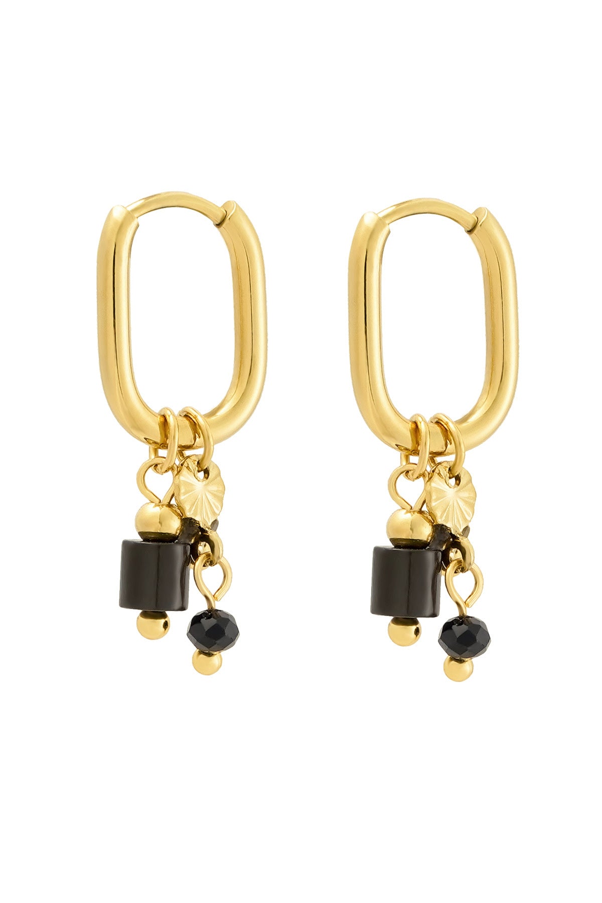 Close up of gold rectangular hoop earrings featuring dangling black stones and gold beads on white background