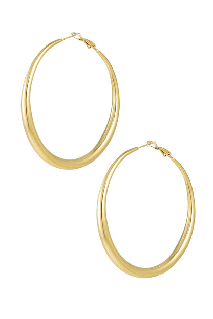 Pair of polished gold minimalist hoop earrings displayed on white background