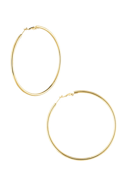 Pair of shiny classic gold hoop earrings with secure snap latch closure on white background