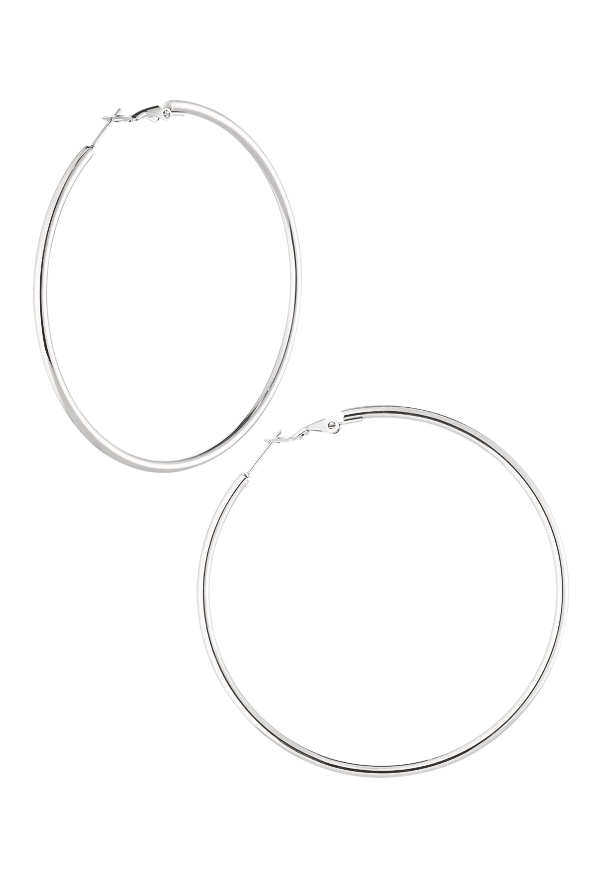 Pair of polished silver-colored large hoop earrings with hinged clasp on a white background