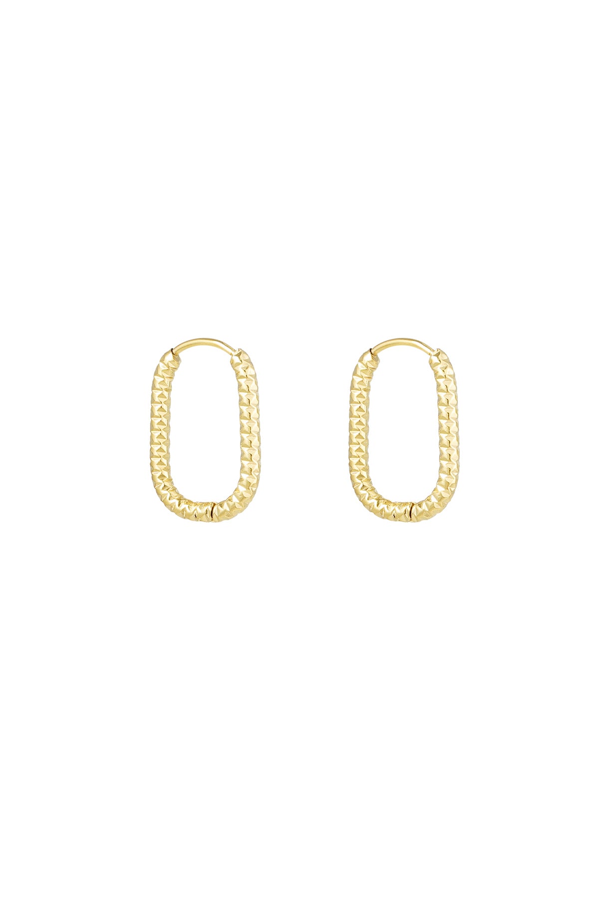 Pair of gold textured oval hoop earrings on white background