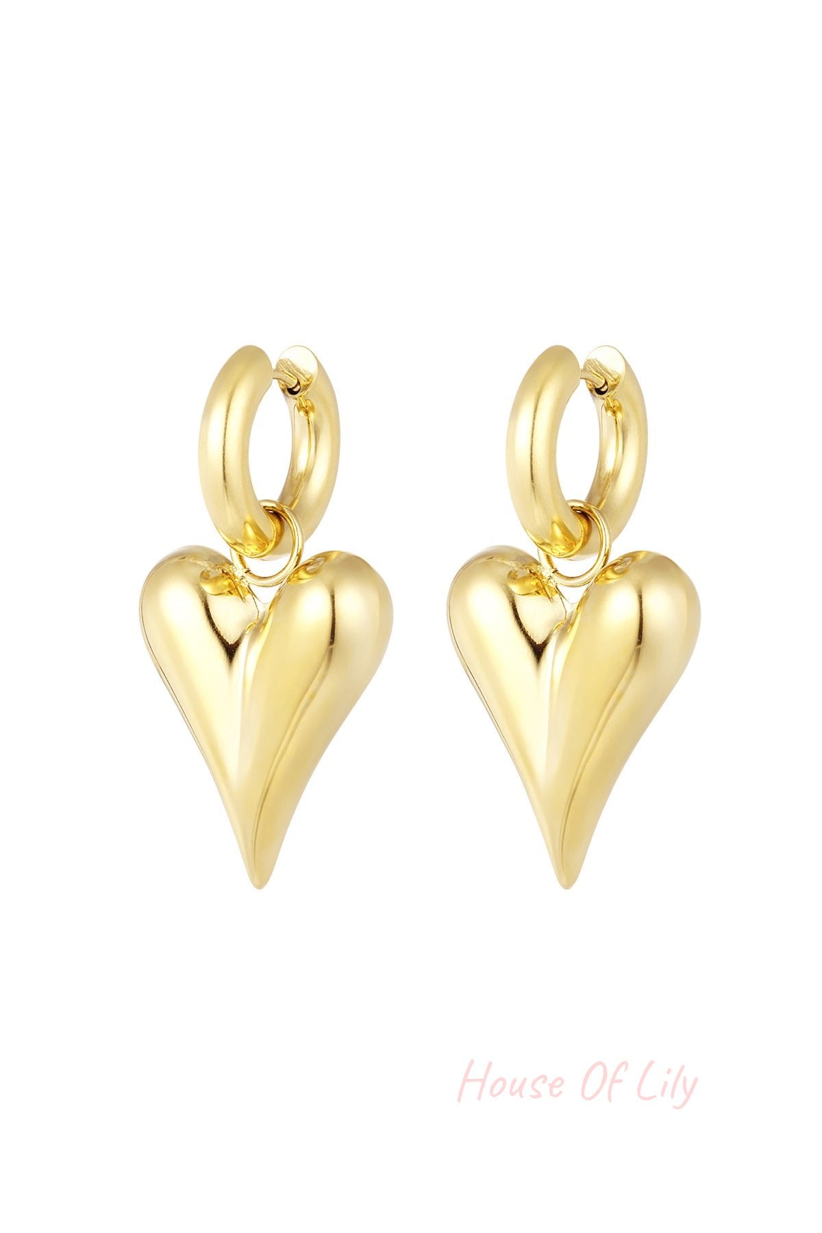 Gold chunky heart hoop earrings with a smooth shiny finish on a white background