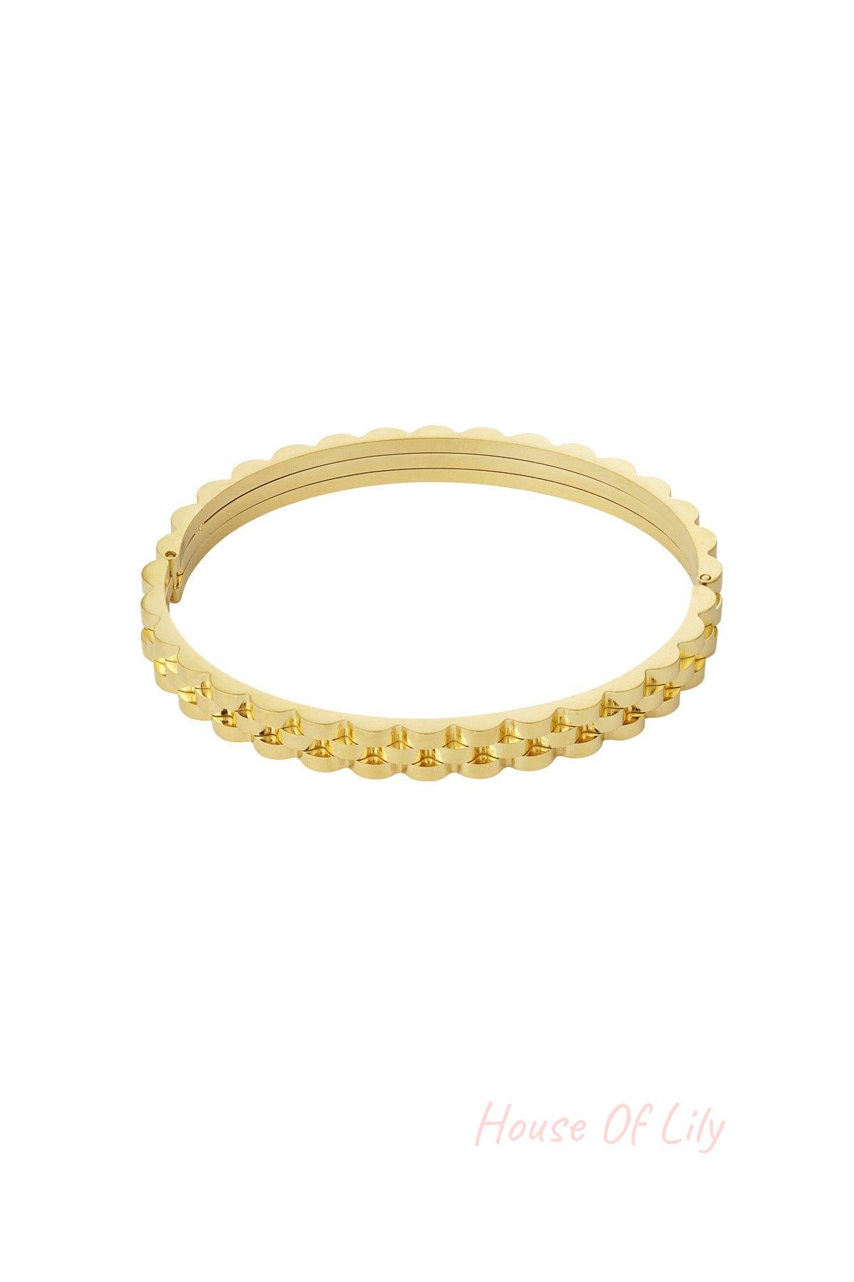 Gold scalloped edge bangle bracelet with hinged clasp on white background