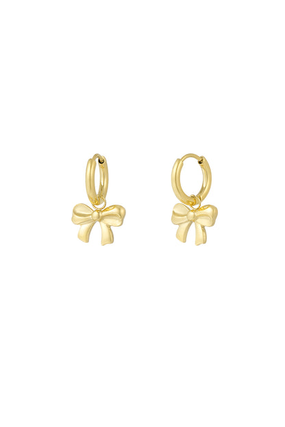 Pair of small gold hoop earrings each featuring a shiny bow-shaped charm hanging elegantly.