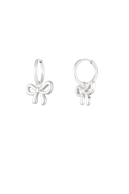 Pair of silver bow hoop earrings with smooth polished finish