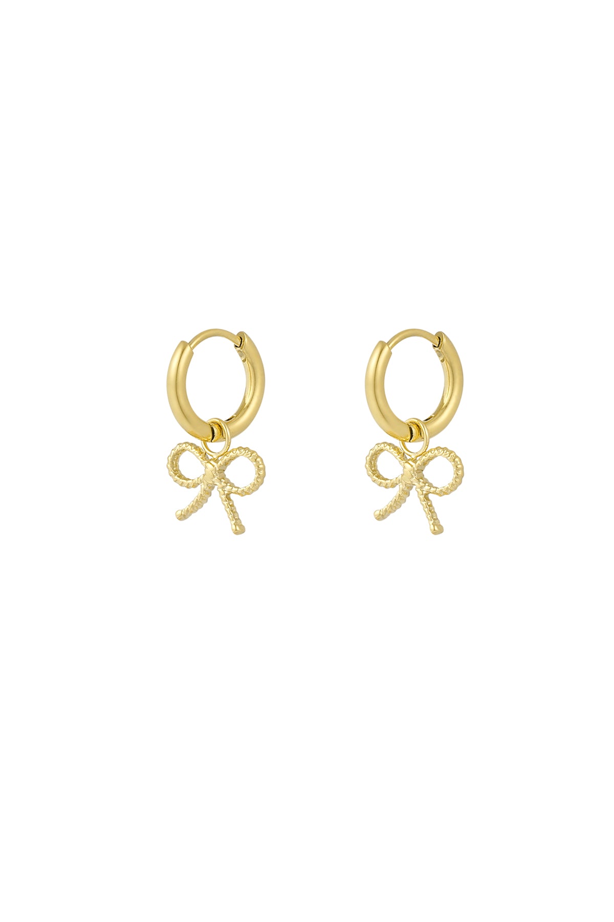 Pair of gold hoop earrings with textured bow charms on white background