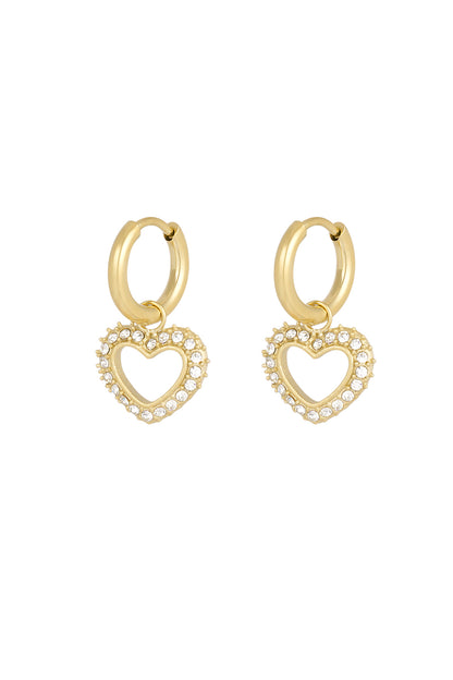 Gold-tone heart-shaped rhinestone drop earrings with smooth hoop closure on white background