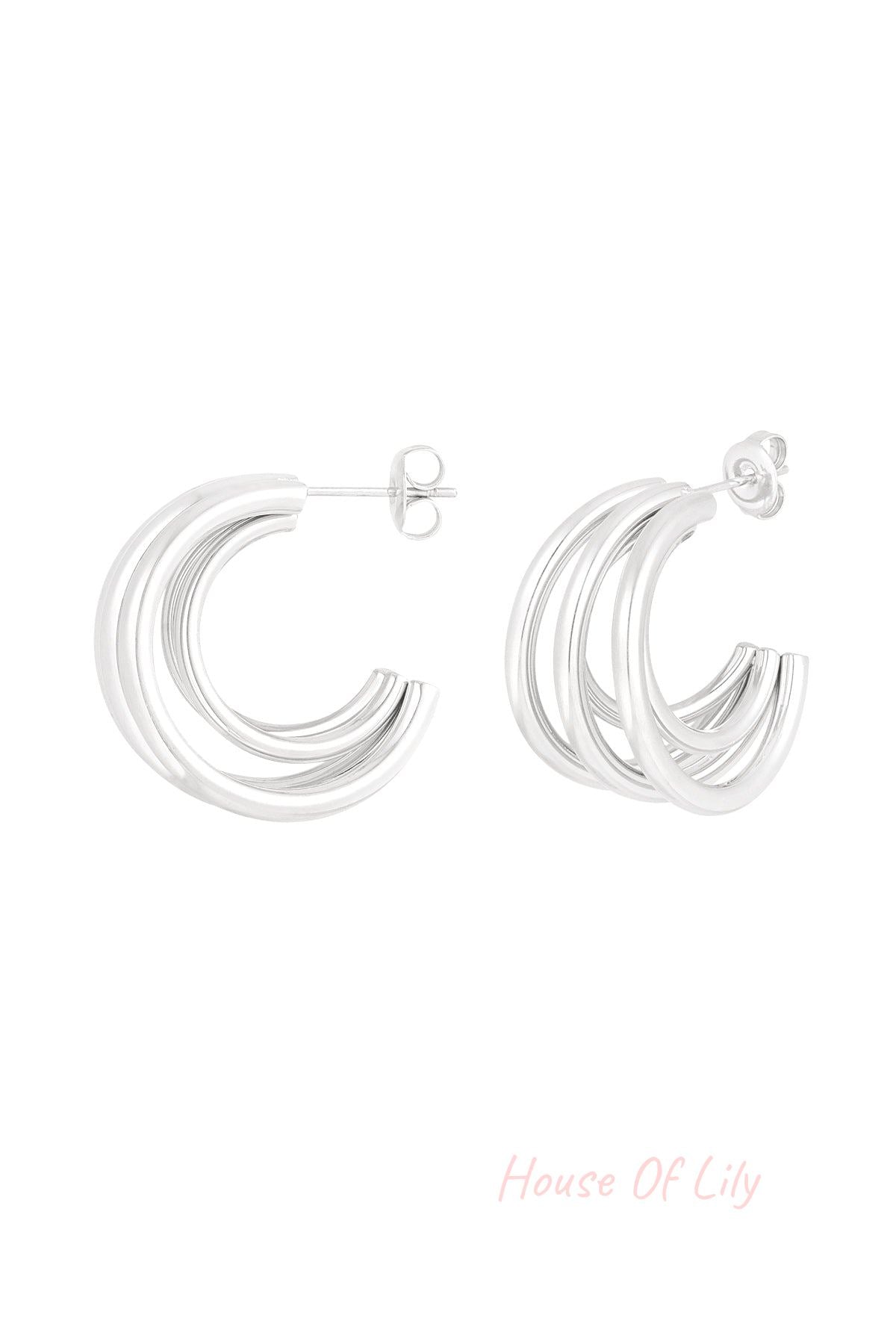 Polished silver tone triple loop hoop earrings isolated on white background showing design detail