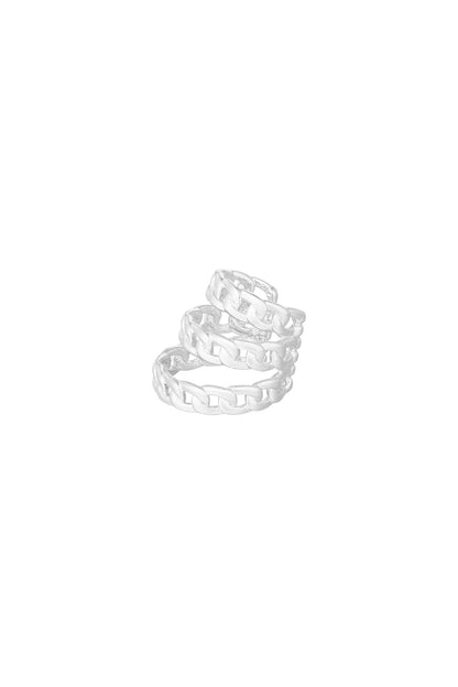 Close-up of silver layered chain link ear cuff on white background