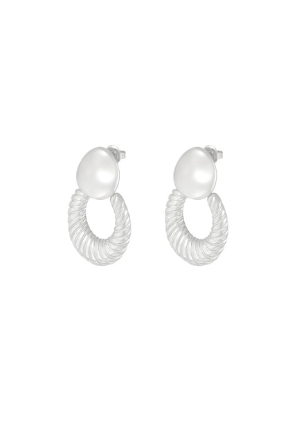 Pair of silver textured hoop stud earrings with smooth pebble-shaped studs on white background