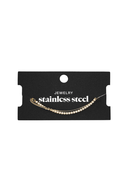 Gold tone crystal bracelet displayed on black card packaging labeled 'stainless steel jewelry'