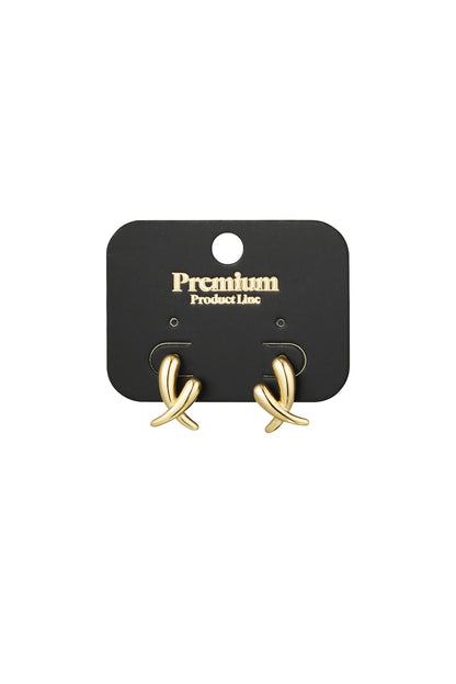 Pair of gold crossed stud earrings displayed on a black Premium Product Line card