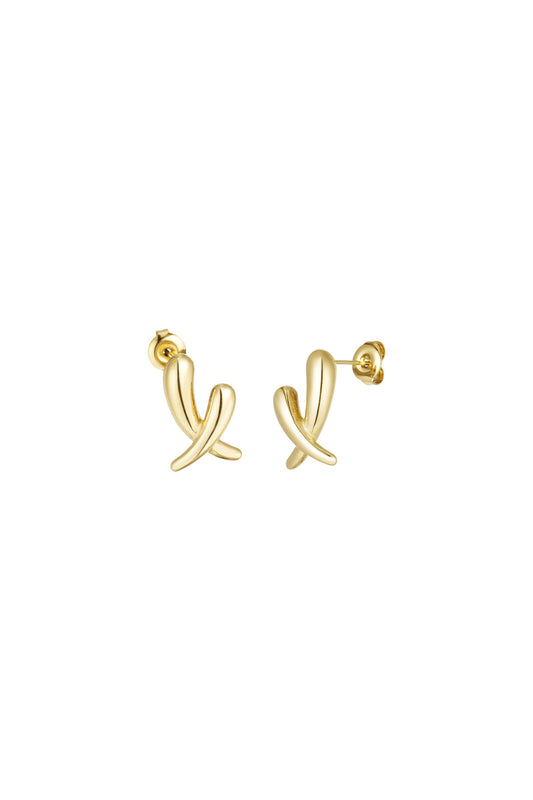 Gold crossed stud earrings isolated on white background, showing smooth polished surfaces